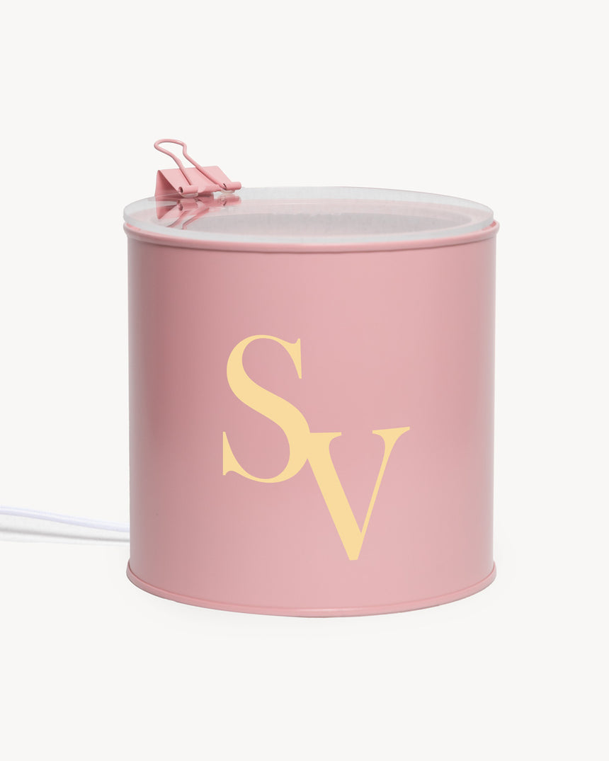 Lamp with crossed text